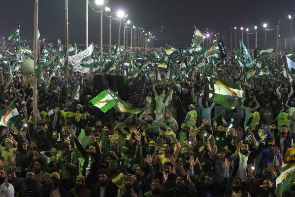 Supporters of the Pakistani religious group Tehreek-e-Labbaik Pakistan (TLP) attend an election campaign rally in Karachi, Pakistan, Sunday, Feb. 4, 2024. (AP Photo/Fareed Khan)
