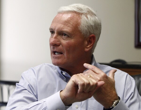 FILE - In this April 19, 2013, file photo, Jimmy Haslam, CEO of Pilot Flying J and owner of the Cleveland Browns, speaks during a news conference at the company headquarters in Knoxville, Tenn. Deposition testimony from billionaire Jimmy Haslam supports claims by Warren Buffett’s Berkshire Hathway that Haslam tried to bribe employees at the Pilot truck stop chain amid a dispute with Berkshire over the future of the company, a Berkshire attorney told a judge Thursday, Dec. 21, 2023. (AP Photo/Wade Payne, File)