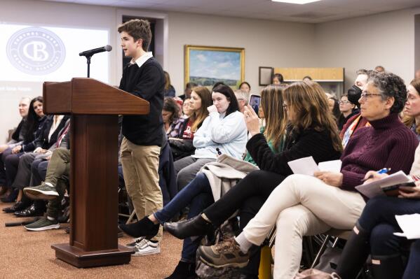 High school student Leo Burchell speaks at the Central Bucks School Board meeting about LGBTQ student rights in Doylestown, Pa., on Tuesday, Nov. 15, 2022. After hearing a man tell the school board that transgender people posed a risk of violence in bathrooms, Leo expected another adult in the room to interrupt what felt like hate speech. No one did. So at the next board meeting, Leo spoke up. “Attacking students based on who they are or who they love is wrong,” he said. Leo has spoken regularly at meetings since. (AP Photo/Ryan Collerd)