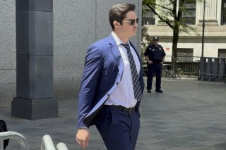 Ryan Salame, 30, who was a high-ranking executive at FTX for most of the exchange's existence, leaves Federal Court, in New York, Tuesday, May 28, 2024. Salami, the co-CEO of FTX Digital Markets, pleaded guilty to illegally making unlawful U.S. campaign contributions and to operating a unlicensed money transmitting business last year, was sentenced to 7.5-years in prison, plus 3 years of supervised release. (AP Photo/Lawrence Neumeister)