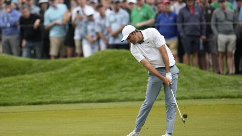 Scottie Scheffler hits from the fairway on the sixth hole during the second round of the PGA Championship golf tournament at Oak Hill Country Club on Friday, May 19, 2023, in Pittsford, N.Y. (AP Photo/Abbie Parr)