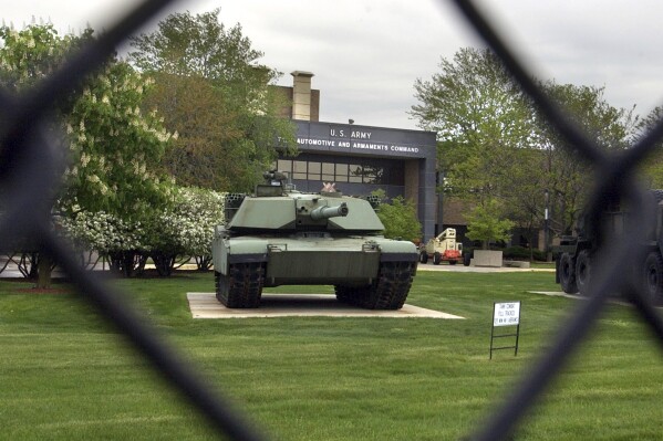 An M1 Abrams tank is displayed outside the Tank-Army Automotive and Armaments Command (TACOM) in Warren, Mich., Friday, May 13, 2005. (AP Photo/Carlos Osorio, file)