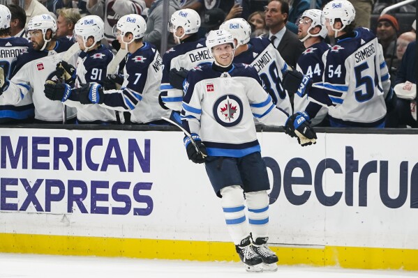 Winnipeg Jets left wing Nikolaj Ehlers celebrates after scoring during the second period of an NHL hockey game against the Los Angeles Kings, Wednesday, Dec. 13, 2023, in Los Angeles. (AP Photo/Ryan Sun)