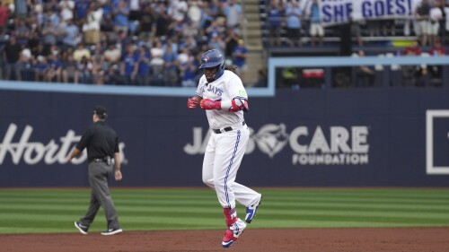 Toronto Blue Jays' Vladimir Guerrero Jr. runs the bases after hitting a solo home run off Arizona Diamondbacks starting pitcher Ryne Nelson during the second inning of a baseball game Friday, July 14, 2023, in Toronto. (Chris Young/The Canadian Press via AP)