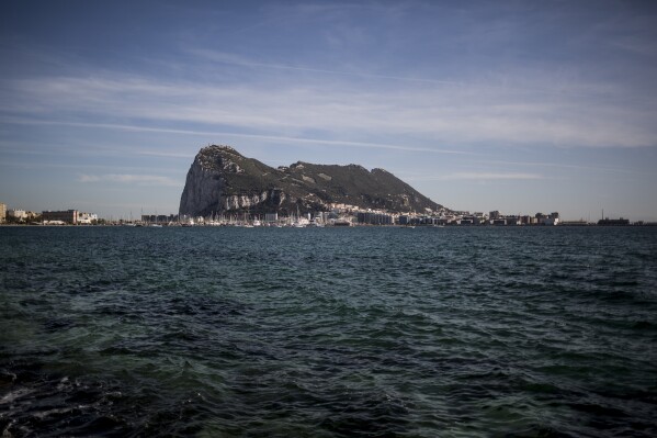 FILE - An Aerial view of Gibraltar rock seen from the neighbouring Spanish city of La Linea, Oct. 17, 2019. The ramming of a small boat by an orca in the Strait of Gibraltar prompted authorities in Spain to recommend Tuesday May 14, 2024 that small vessels stick to the coastline in that region to avoid often-scary interactions with killer whales. (AP Photo/Javier Fergo, File)