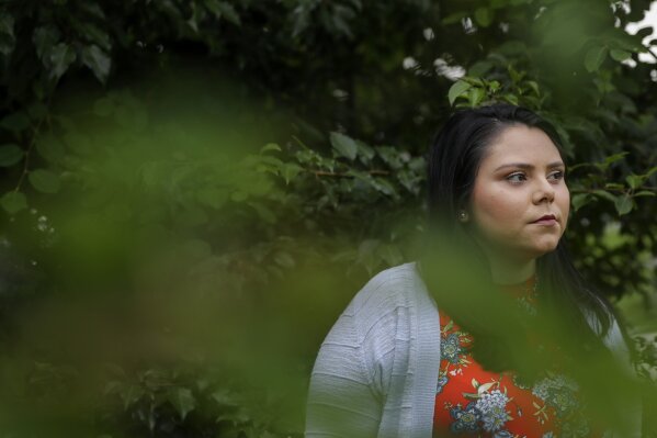Marisol Estrada, 26, of Atlanta, poses for a portrait Sunday, June 14, 2020, in Atlanta. Because of DACA, Estrada was able to graduate from college with a degree in political science in three years and is about to start law school. The U.S. Supreme Court has kept alive, for now, the Obama-era program that allows immigrants brought here as children to work and protects them from deportation. The high court on Thursday, June 18, 2020 ruled that the Trump administration attempted to end the program improperly when it announced it was rescinding it in 2017. (AP Photo/Brynn Anderson)