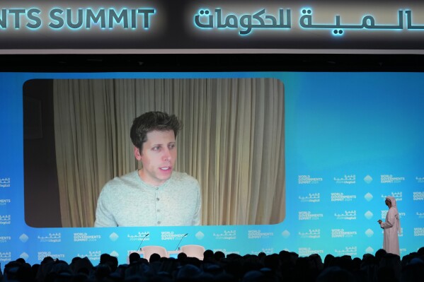 OpenAI CEO Sam Altman talks on a video chat during the World Government Summit in Dubai, United Arab Emirates, Tuesday, Feb. 13, 2024. The CEO of ChatGPT maker OpenAI said Tuesday that the danger that keeps him awake at night regarding artificial intelligence are the "very subtle societal misalignments" that can make the systems wreck havoc. (AP Photo/Kamran Jebreili)