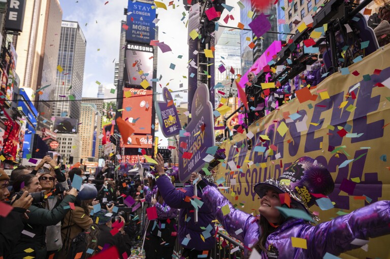 Confetti is released during a confetti test ahead of New Year's Eve in Times Square on Friday, Dec. 29, 2023, in New York.  (AP Photo/Yuki Iwamura)