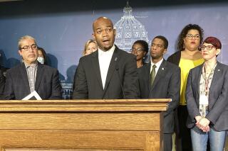 Democratic State Rep. Cedrick Frazier, of New Hope, speaks at a news conference in the Minnesota State Capitol in St. Paul, Minn., on Thursday, March 24, 2022, about a beefed up $150 million public safety plan by House Democrats. (AP Photo/Steve Karnowski)