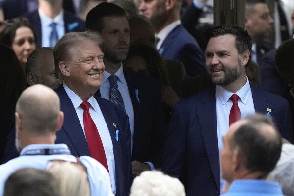Republican presidential nominee former President Donald Trump and Republican vice presidential nominee Sen. JD Vance, R-Ohio, arrive for the 9/11 Memorial ceremony on the 23rd anniversary of the Sept. 11, 2001 terror attacks, Wednesday, Sept. 11, 2024, in New York. (AP Photo/Pamela Smith)