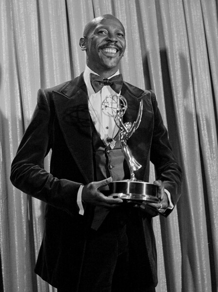 FILE - Louis Gossett Jr., poses with the Emmy he received for his role in the TV drama "Roots," at the Academy of Television, Arts and Sciences awards show in Los Angeles on Sept. 11, 1977. Gossett Jr., the first Black man to win a supporting actor Oscar and an Emmy winner for his role in the seminal TV miniseries “Roots,” has died. He was 87. (AP Photo, File)