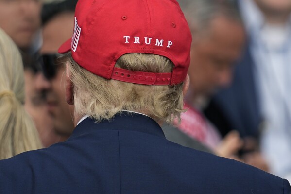 Republican presidential candidate and former President Donald Trump greets supporters after speaking at the South Texas International Airport Sunday, Nov. 19, 2023, in Edinburg, Texas. (AP Photo/Eric Gay)