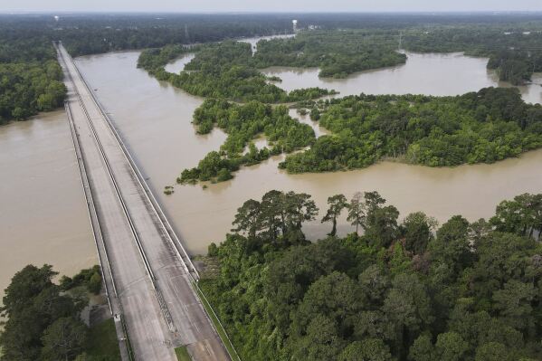 The bridge over Lake Houston along West Lake Houston Parkway from Kingwood to Atascocita is seen after it was closed due to high water on either side of the thoroughfare, Saturday, May 4, 2024, in Kingwood, Texas. (Jason Fochtman/Houston Chronicle via AP)
