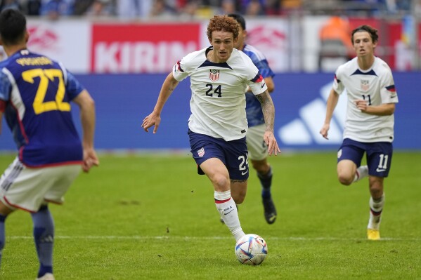 FILE - United States' Joshua Sargent (24) plays against Japan during an international friendly soccer match in Duesseldorf, Germany, Friday, Sept. 23, 2022. United States forward Josh Sargent could miss Saturday's June 8, 2024, friendly against Colombia and could be dropped from the Copa America roster. A 24-year-old from O'Fallon, Missouri, Sargent scored 16 goals in 26 league games with Norwich in England's second-tier League Championship but finished the season while playing with foot swelling. (AP Photo/Martin Meissner, File)