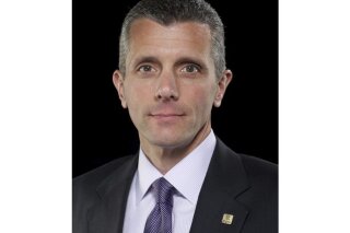 This undated photo provided by Cigna shows David Cordani, President and Chief Executive Officer of Cigna. Cordani spoke recently with The Associated Press during an interview. (Thaddeaus Harden Photography/Cigna via AP)