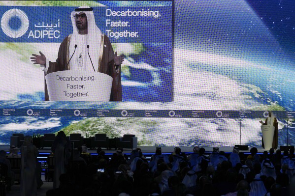 FILE - Sultan al-Jaber, the COP28 President-Designate and UAE's Special Envoy for Climate Change, talks during the ADIPEC, Oil and Energy exhibition and conference in Abu Dhabi, United Arab Emirates, Oct. 2, 2023. The host country of COP28 is the oil state United Arab Emirates and it has named al-Jaber, who also runs a renewable energy company, as the conference president. He and his colleagues say by bringing fossil fuel companies to the table they can get more done and that it may take someone in the industry to get the concessions needed. (AP Photo/Kamran Jebreili, File)