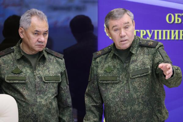 FILE - Russian Defense Minister Sergei Shoigu, left, and Chief of the Russian General Staff Valery Gerasimov attend the meeting with Russian President Vladimir Putin during his visit to the joint staff of troops involved in Russia's military operation in Ukraine, at an unknown location, Saturday, Dec. 17, 2022. The chief of the military's General Staff, Gen. Valery Gerasimov, was named the new chief of the Russian forces in Ukraine. (Gavriil Grigorov, Sputnik, Kremlin Pool Photo via AP, File)