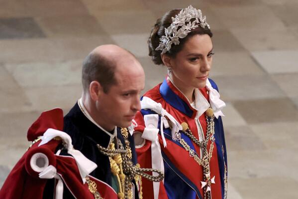 Britain's Prince William and Kate, Princess of Wales, arrive at the coronation of King Charles III at Westminster Abbey, London, Saturday, May 6, 2023. (Phil Noble/Pool Photo via AP)