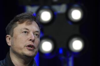 FILE - Elon Musk speaks at the SATELLITE Conference and Exhibition March 9, 2020, in Washington. Social media users falsely claimed Musk's Twitter account was suspended after he announced on Friday that he is abandoning his $44 billion offer to buy the platform. (AP Photo/Susan Walsh, File)