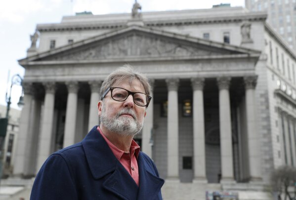 
              Brian Toale, 65, a sexual abuse victim when he was a student in a Long Island Catholic school, and now an activist, poses for a photograph in front of Thurgood Marshall Courthouse in New York's Foley Square on Wednesday, Jan. 9, 2019. Toale is in favor of revising existing statute of limitations laws to give victims of long-ago sex abuse a window to get their day in court. As a new legislative season begins, prospects for reforming such laws are high, especially in New York State. (AP Photo/Kathy Willens)
            