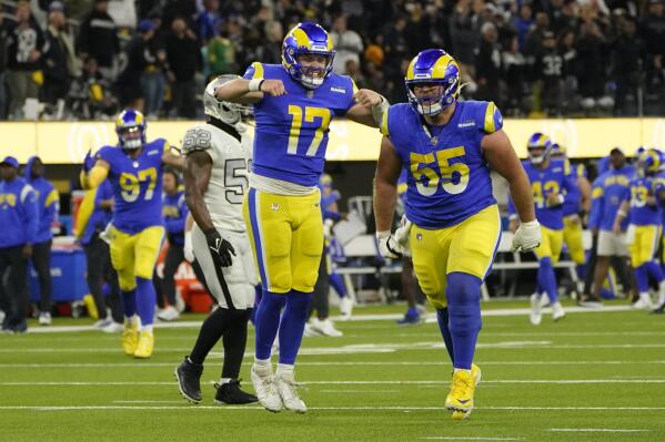 Los Angeles Rams quarterback Baker Mayfield (17) celebrates a touchdown by wide receiver Van Jefferson during the second half of an NFL football game against the Las Vegas Raiders, Thursday, Dec. 8, 2022, in Inglewood, Calif. (AP Photo/Marcio Jose Sanchez)