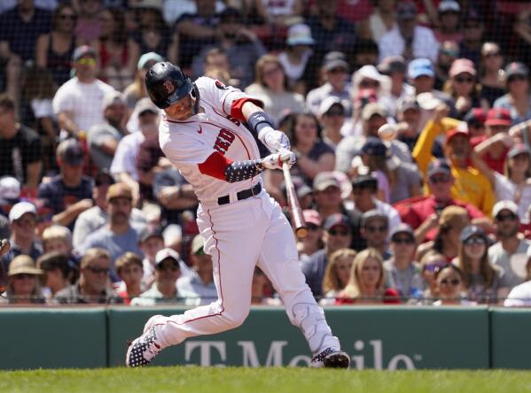 Trevor Story of the Boston Red Sox walks through the batting