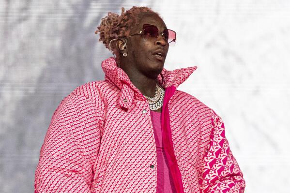 FILE - Young Thug performs at the Lollapalooza Music Festival in Chicago on Aug. 1, 2021.  The rapper says that an apartment concierge let an unknown person take his Louis Vuitton bag holding jewelry, money and about 200 unreleased songs. (Photo by Amy Harris/Invision/AP, File)