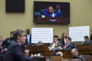 Michael Cohen, President Donald Trump's former lawyer, testifies before the House Oversight and Reform Committee, on Capitol Hill, Wednesday, Feb. 27, 2019, in Washington. (AP Photo/...
