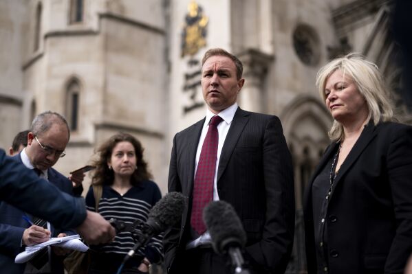 Financial market trader Tom Hayes speaks to the media, with his lawyer Karen Todner, right, outside the Royal Courts Of Justice in London after two former financial market traders convicted of interest rate benchmark manipulation have had bids to clear their names rejected by the Court of Appeal, on Wednesday March 27, 2024. Tom Hayes, 44, a former Citigroup and UBS trader, was found guilty of multiple counts of conspiracy to defraud over manipulating the London Inter-Bank Offered Rate (Libor) between 2006 and 2010. His case, alongside that of another similarly jailed trader Carlo Palombo, 45, were referred to the court by the Criminal Cases Review Commission (CCRC), which investigates potential miscarriages of justice. (Jordan Pettitt/PA via AP)