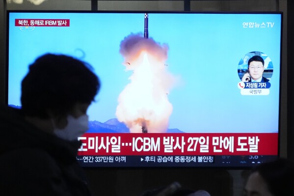 A TV screen shows a file image of North Korea's missile launch during a news program at the Seoul Railway Station in Seoul, South Korea, Sunday, Jan. 14, 2024. North Korea fired a ballistic missile toward the sea on Sunday, its neighbors said, in its first missile launch this year, as the North is expected to further raise regional animosities in an election year for its rivals South Korea and the United States. (AP Photo/Ahn Young-joon)