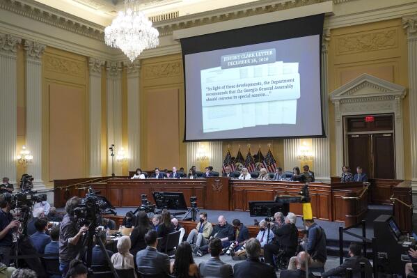 A letter from former Justice Department official Jeffrey Clark is shown on a screen, as the House select committee investigating the Jan. 6 attack on the U.S. Capitol continues to reveal its findings of a year-long investigation, Thursday, June 23, 2022, at the Capitol in Washington. (Demetrius Freeman/The Washington Post via AP, Pool)