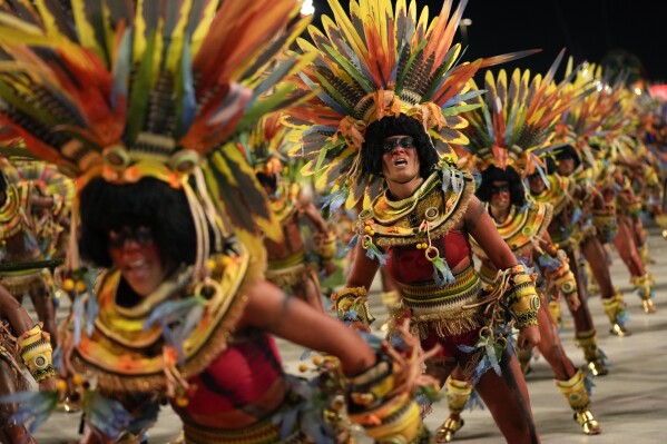 Performers from the Salgueiro samba school parade during Carnival celebrations at the Sambadrome in Rio de Janeiro, Brazil, Monday, Feb. 12, 2024. (APPhoto/Silvia Izquierdo)