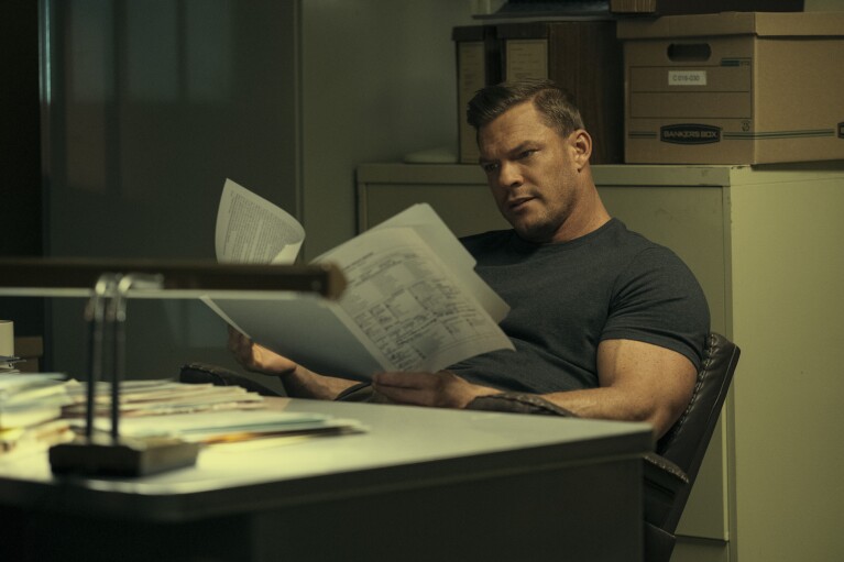 This image released by Prime Video shows Alan Ritchson in a scene from "Reacher." (Brooke Palmer/Prime Video