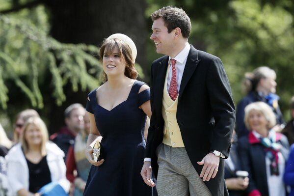 
              FILE - In this Saturday, May 20, 2017 file photo, Britain's Princess Eugenie and Jack Brooksbank arrive for the wedding of Pippa Middleton and James Matthews at St Mark's Church in E...