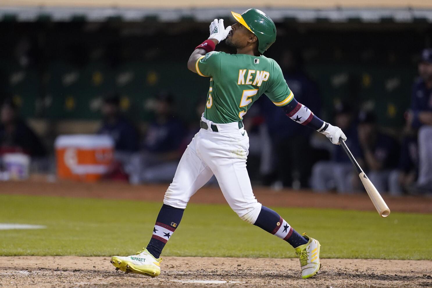 Kemp's sacrifice fly lifts A's over Red Sox 7-6 in 12