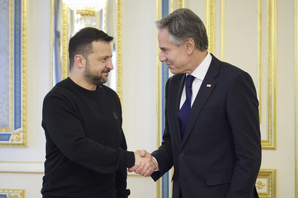 In this photo provided by the Ukrainian Presidential Press Office, Ukraine's President Volodymyr Zelenskyy, left, greets U.S. Secretary of State Antony Blinken, right, prior to their meeting in Kyiv, Ukraine, Tuesday, May 14, 2024. Blinken arrived in Kyiv on Tuesday in an unannounced diplomatic mission to reassure Ukraine that it has American support as it struggles to defend against increasingly intense Russian attacks. (Ukrainian Presidential Press Office via AP)