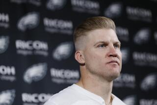 FILE - Philadelphia Eagles' Josh McCown speaks during a news conference after an NFL wild-card playoff football game against the Seattle Seahawks, Jan. 5, 2020, in Philadelphia. McCown played quarterback for 12 teams across nearly two decades in the NFL, and learned a different offense almost every season. He looks forward to sharing his knowledge and experience as a coach. (AP Photo/Michael Perez, File)