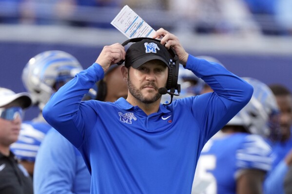 FILE - Memphis head coach Ryan Silverfield watches from the sideline in the first half of an NCAA college football game against Central Florida Saturday, Nov. 5, 2022, in Memphis, Tenn. Memphis needs a win to post just the fifth season in program history with at least 10 victories and fourth since 2014. The Tigers also can get some payback Friday, Dec. 29 in the Liberty Bowl for losing the very same game to Iowa State by a single point when Memphis was ranked. (AP Photo/Mark Humphrey, File)