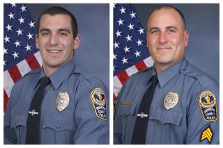 FILE - This combination of undated photos provided by the Gwinnett County Police Department shows Master Police Officer Robert McDonald, left, and Sgt. Michael Bongiovanni in their official portraits. A man who was punched and kicked in the head by the Georgia police officers during a traffic stop four years ago has filed a lawsuit. It alleges the stop was unjustified and the officers used excessive force against him. Bongiovanni and McDonald were fired a day after the April 2017 traffic stop when video surfaced. (Gwinnett County Police Department via AP)