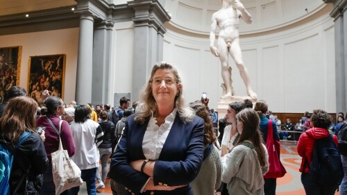 FILE-- Cecilie Hollberg, director of the Accademia Gallery poses in front of Michelangelo's white marble statue 