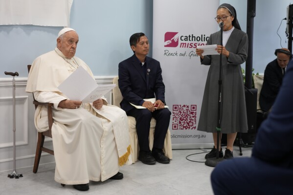 Pope Francis attends a meeting with charity workers and the inauguration of the House of Mercy in Ulaanbaatar, Monday, Sept. 4, 2023. Francis toured the House of Mercy in the final event of an historic four-day visit to a region where the Holy See has long sought to make inroads. (AP Photo/Andrew Medichini)