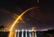 A SpaceX Falcon 9 rocket is launched from a pad at Kennedy Space Center, seen from Port Canaveral, Fla. Thursday, Feb. 15, 2024. (Malcolm Denemark/Florida Today via AP)