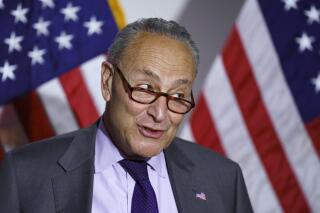 Senate Majority Leader Chuck Schumer, D-N.Y., speaks to reporters after the Democrats' policy luncheon, on Capitol Hill in Washington, Tuesday, May 11, 2021. (AP Photo/J. Scott Applewhite)