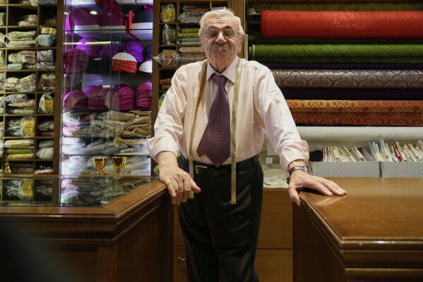 Italian tailor Raniero Mancinelli ,who on his own initiative is making outfits for a possible future Pope, is interviewed by the Associated Press inside his shop in Rome, Wednesday, April 30, 2025. (AP Photo/Gregorio Borgia)