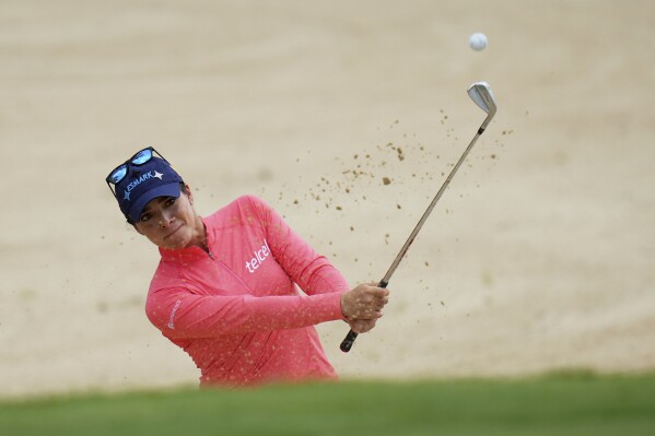 Gaby Lopez, of Mexico, hits on the eighth hole during the first round of the Chevron Championship LPGA golf tournament Thursday, April 24, 2025, in The Woodlands, Texas. (AP Photo/Eric Gay)