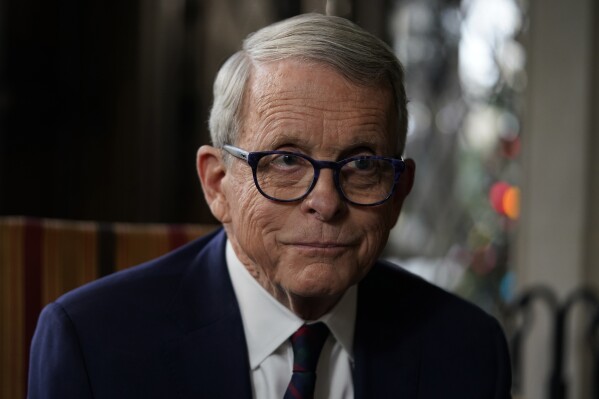 Ohio Gov. Mike DeWine pauses as he speaks during an interview with the Associated Press at The Ohio Governor's Residence in Columbus, Ohio, Thursday, Dec. 21, 2023. (AP Photo/Carolyn Kaster)