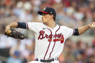 Da atlanta braves button up jersey ve Roberts' pitching decisions