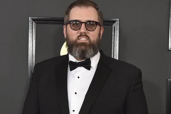 FILE - This Feb. 12, 2017 file photo shows songwriter and producer busbee at the 59th annual Grammy Awards in Los Angeles. Warner Records sent out a statement on Sunday saying busbee, whose real name was Michael James Ryan, died, but no cause of death or date was given. He was 43. (Photo by Jordan Strauss/Invision/AP, File)
