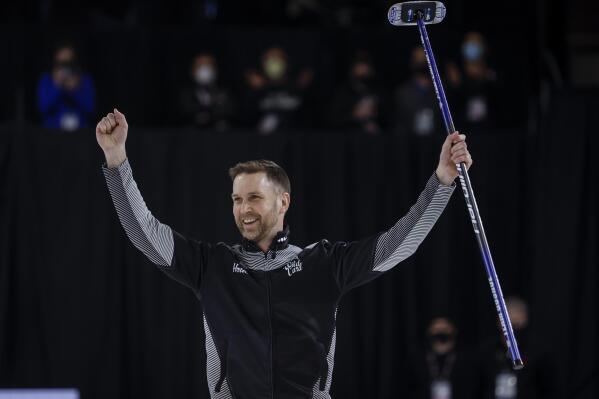 Team Wild Card One skip Brad Gushue celebrates his win after defeating Team Alberta during finals action at the Tim Hortons Brier curling event in Lethbridge, Alberta, Sunday, March 13, 2022. (Jeff McIntosh/The Canadian Press via AP)