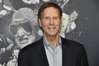 
              FILE - In this June 27, 2018 file photo, Bob Einstein arrives at the Los Angeles premiere of "Robin Williams: Come Inside My Mind" at the TCL Chinese Theatre.  Albert Brooks, the younger brother of Einstein says the comedy veteran known for "The Smothers Brothers Comedy Hour" and "Curb Your Enthusiasm" has died. He was 76.  Brooks, posted a tweet Wednesday, Jan. 2, 2019, in which he said Einstein "will be missed forever."  (Photo by Chris Pizzello/Invision/AP, File)
            